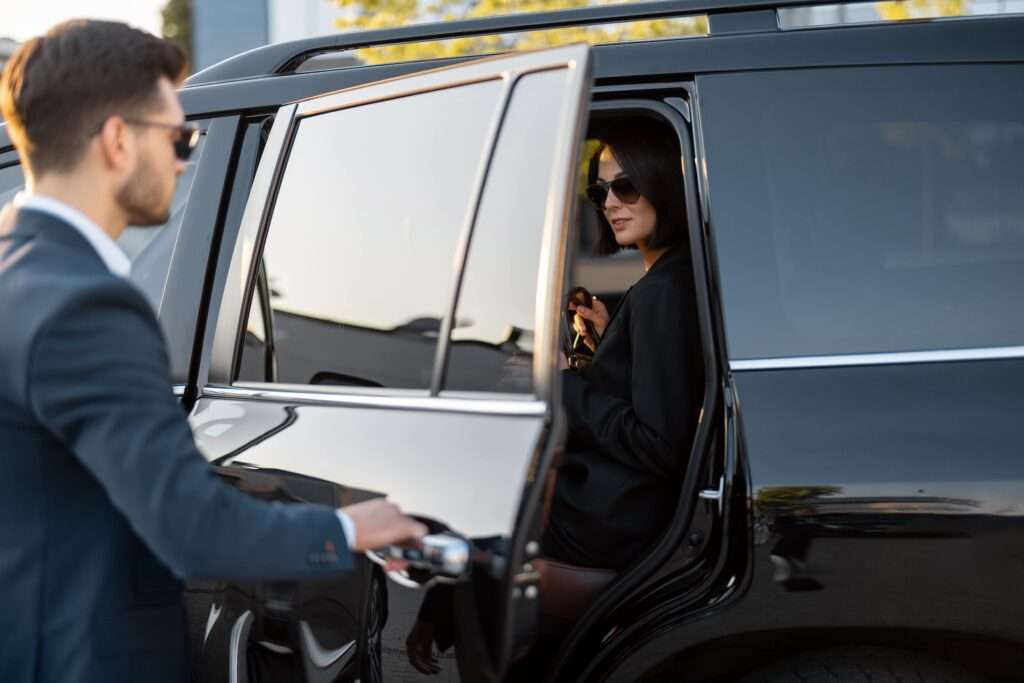 business-couple-travel-by-car